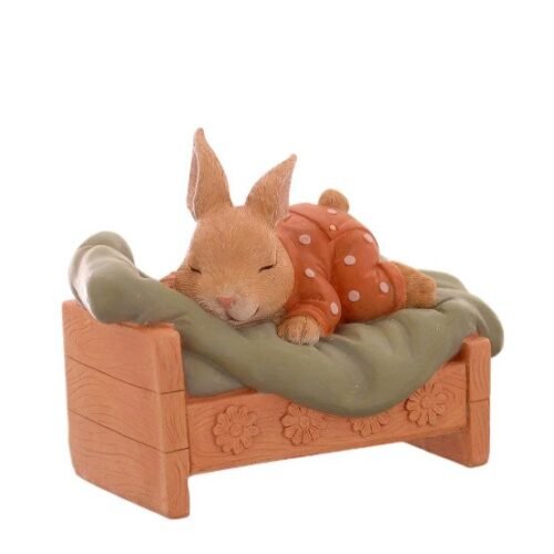 Coelho de Pijama Laranja a Dormir na Cama